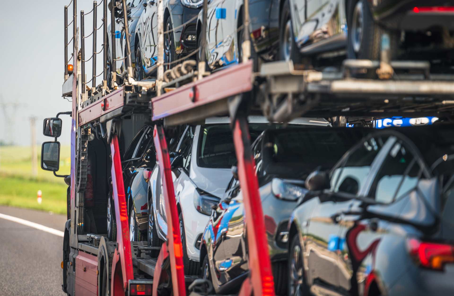 Car carrier truck on the highway | Featured Image for the Sell My Car Toowoomba Location Page.